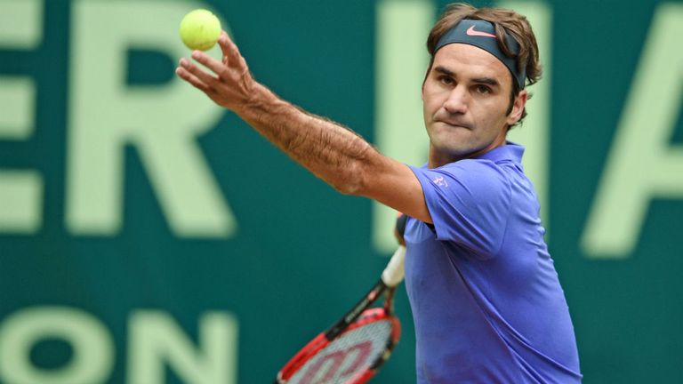 Roger Federer  serves in his match against Florian Mayer at the Gerry Weber Open