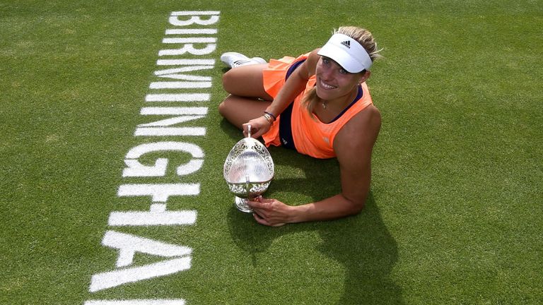 Angelique Kerber poses after victory in her singles final match against Karolina Pliskova at the Aegon Classic at Edgbaston Priory Club