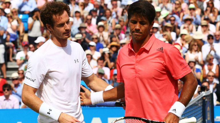 Andy Murray walks off court with Fernando Verdasco at Queen's Club