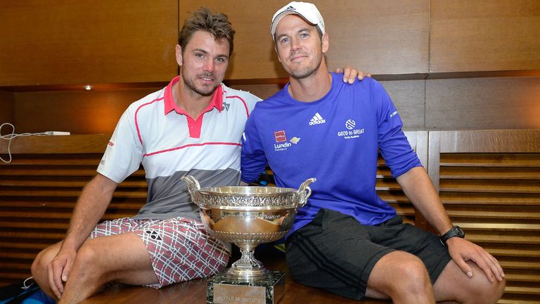 Stan Wawrinka poses with the Coupe de Mousquetaires and coach Magnus Norman after the 2015 French Open final