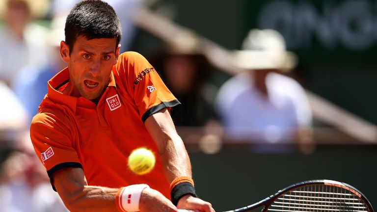 Novak Djokovic plays a forehand against Andy Murray at the 2015 French Open