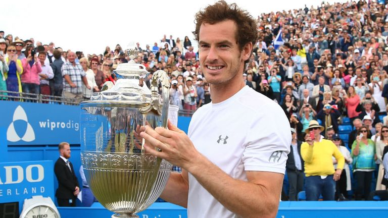 Andy Murray  celebrates victory with the trophy against Kevin Anderson at the Aegon Championships at Queen's Club 