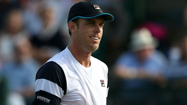 Sam Querrey  celebrates victory against Gilles Simonduring their quarter-final match in Nottingham