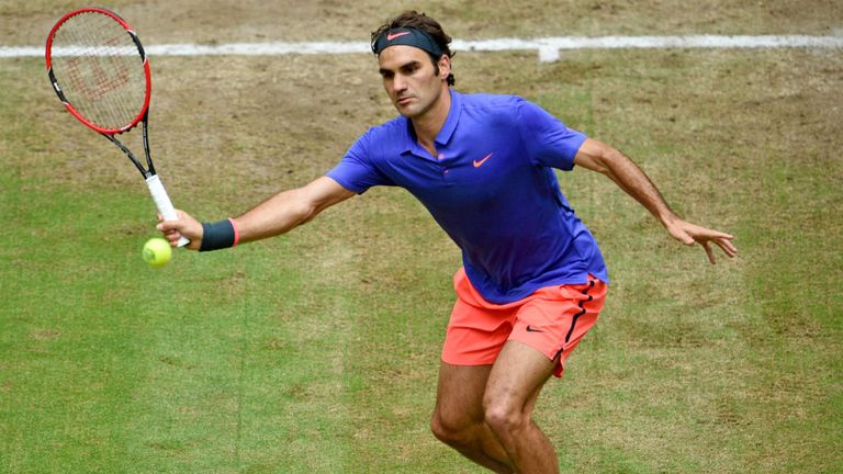 Roger Federer plays a forehand in the final match against Andreas Seppi during the Gerry Weber Open