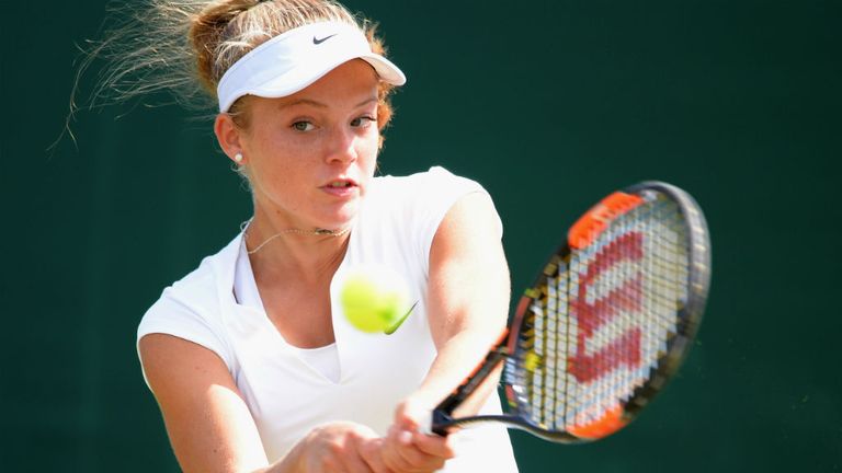 Katie Swan in action against Tamira Paszek during the 2015 Wimbledon Qualifying Session 