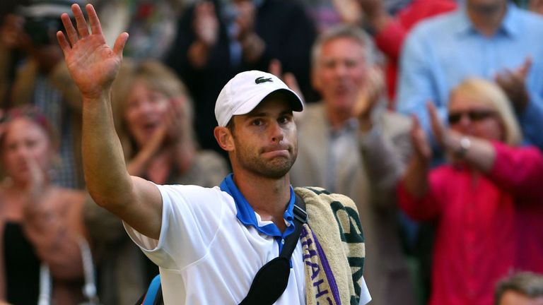 Andy Roddick walks off court after being defeated third round match against David Ferrer at Wimbledon