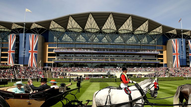 Queen Elizabeth II, The Duke of Edinburgh, Prince Andrew, Duke of York and Princess Beatrice arrive by carriage before the first race during Ladies Day