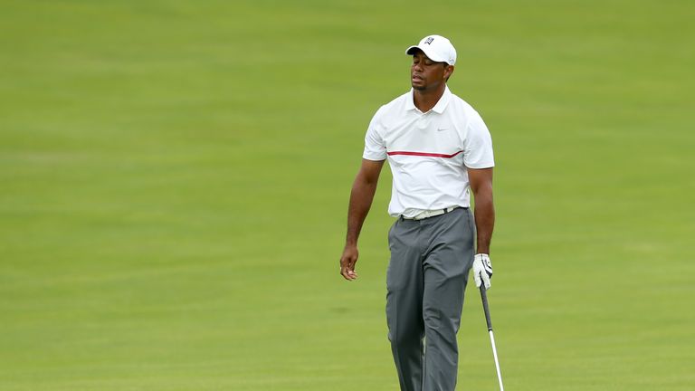 Tiger Woods shows his despair after finding water at the 17th