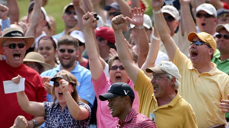 DUBLIN, OH - JUNE 07: Tiger Woods and the crowd react after he chipping in for eagle on the 11th hole during the final round of the Memorial Tournament on 