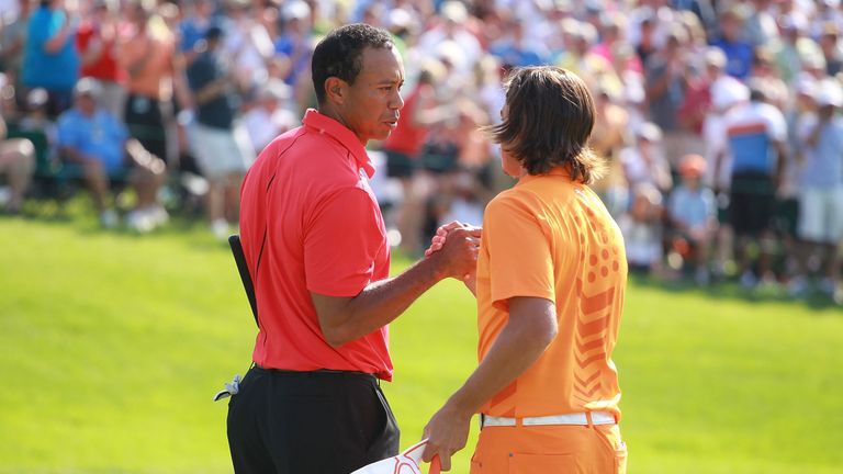 Tiger Woods is congratulated by Rickie Fowler following the final round of the Memorial Tournament presented by Nationwide Insurance