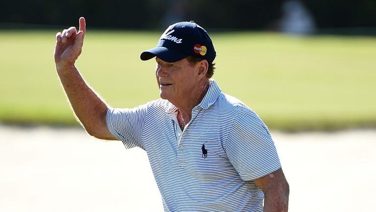 Tom Watson of the United States reacts to his birdie on the 15th hole