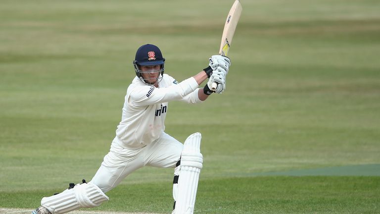 Tom Westley of Essex drives the ball for four runs against Northants