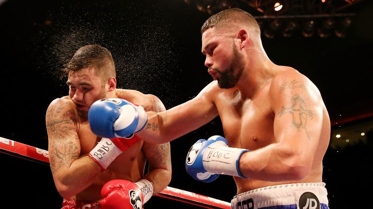 LIVERPOOL, ENGLAND - NOVEMBER 22:  Tony Bellew catches Nathan Cleverly