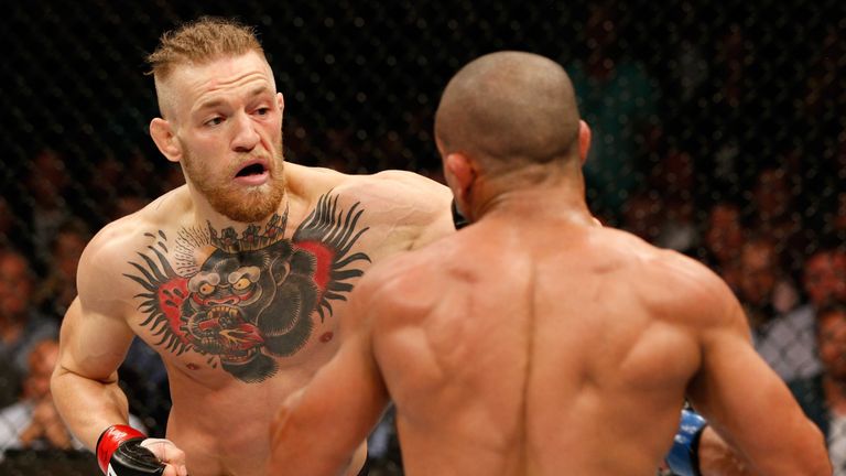 Conor McGregor and Diego Brandao in their featherweight bout during the UFC Fight Night event at The O2 Dublin on July 19, 2014 in Dublin, Ireland.