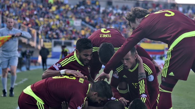 Venezuela's forward Jose Rondon celebrates with teammates after scoring against Colombia during their 2015 Copa America.