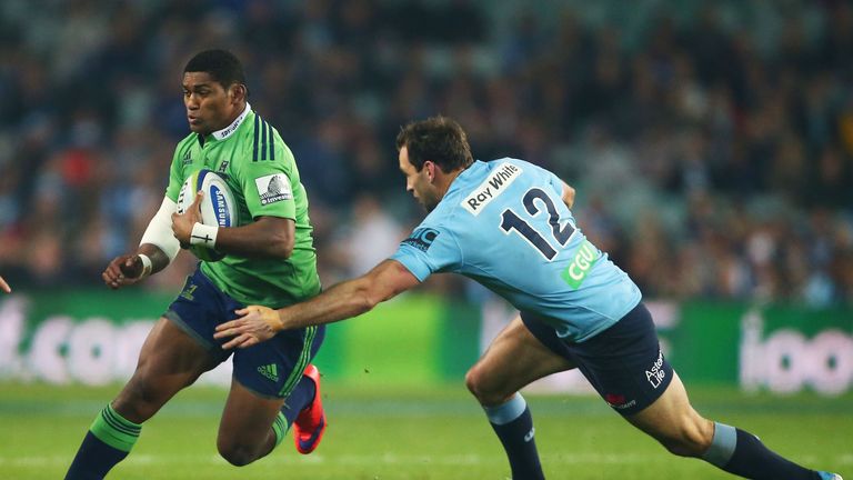 Waisake Naholo of the Highlanders takes on the Waratahs defence during the Super Rugby Semi Final match