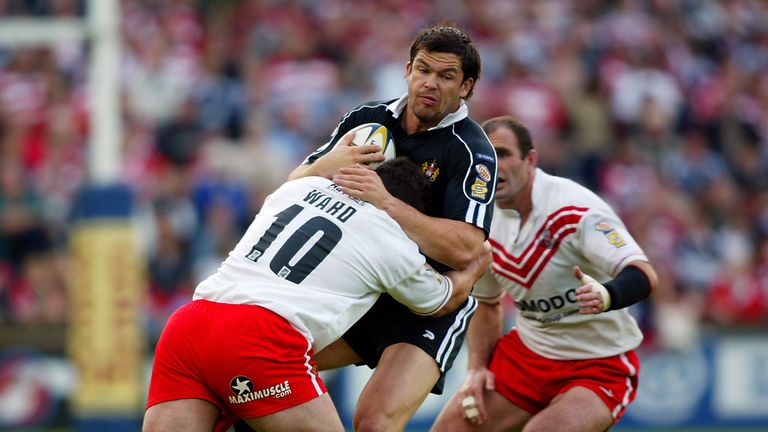  Andy Farrell of Wigan Warriors is tackled by Barry Ward of St Helens during the Tetleys Super League match between St Helens and Wigan in 2003