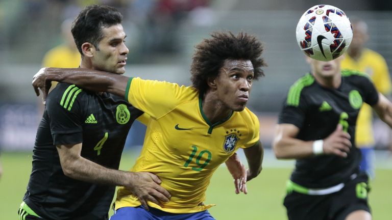 Brazil's Willian and Mexico's Rafa Marquez in friendly action ahead of the Copa America  