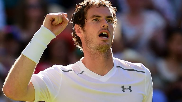Andy Murray celebrates winning his against Mikhail Kukushkin at Wimbledon