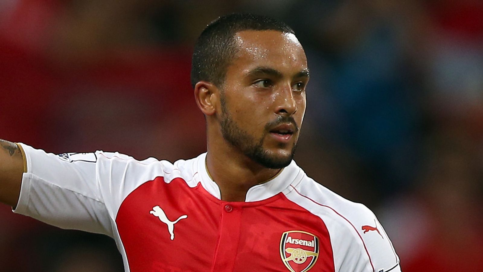 Theo Walcott urges Arsenal to move on after Champions League setback