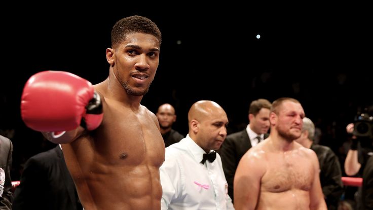 LONDON, ENGLAND - OCTOBER 11:  Anthony Joshua celebrates his victory over Denis Bakhtov during their Vacant WBC International Heavyweight Championship bout