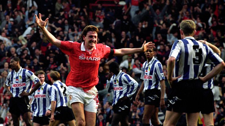 Steve Bruce celebrates his second goal for Manchester United which gave them a 2-1 win over Sheffield Wednesday and the Premier League title, April 1993