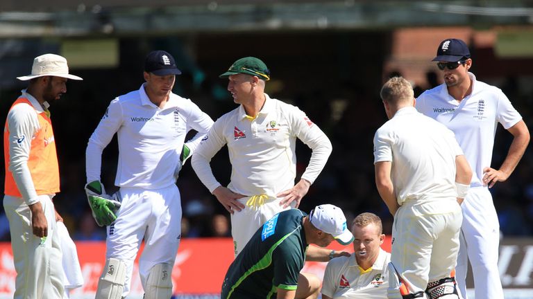 Australias Chris Rogers is attended to before leaving the field during day four of the second Ashes Test at Lords. Picture: John Walton / PA Wire/Press Association Images