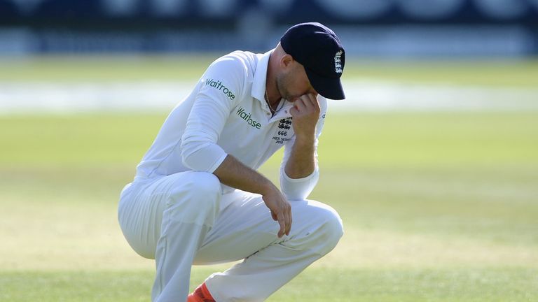 Adam Lyth of England reacts after dropping David Warner of Australia during day three of the 2nd Investec Ashes Test match betwe