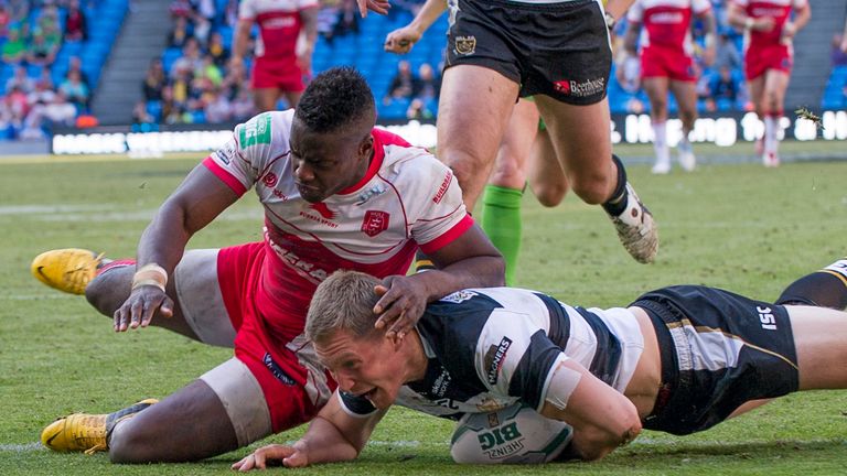 Hull KR's Alex Brown can't prevent Hull FC's Chris Green scoring the game-winning try