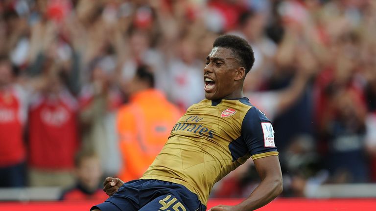 Alex Iwobi celebrates scoring the 3rd Arsenal goal during the match between Arsenal and Olympique Lyonnais at Emirates Stadium on July 25, 2015