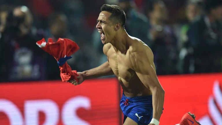 Alexis Sanchez celebrates after scoring the winning penalty for Chile at the Copa America