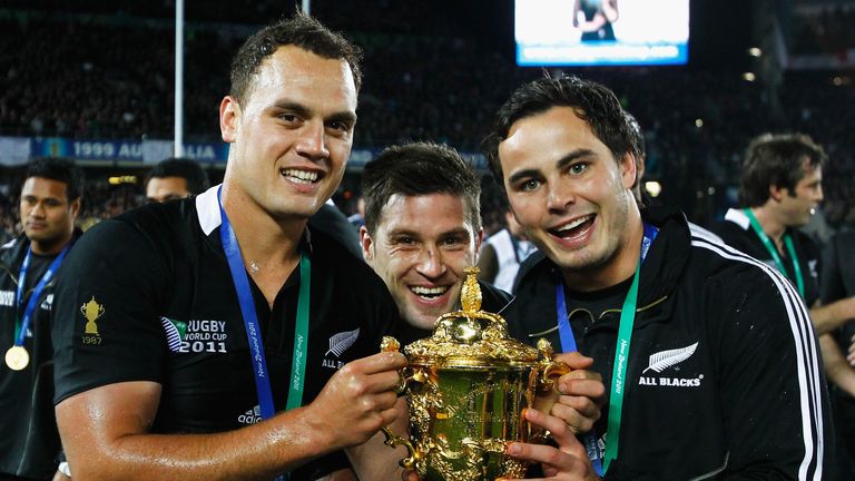 (L-R)  Israel Dagg, Cory Jane and Zac Guildford pose with the Webb Ellis Cup after the 2011 Rugby World Cup.