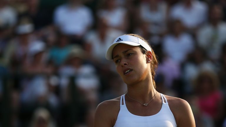 Ana Ivanovic reacts after a point against  Bethanie Mattek-Sands in their women's singles second round match on day three of the 2015 Wimbledon 