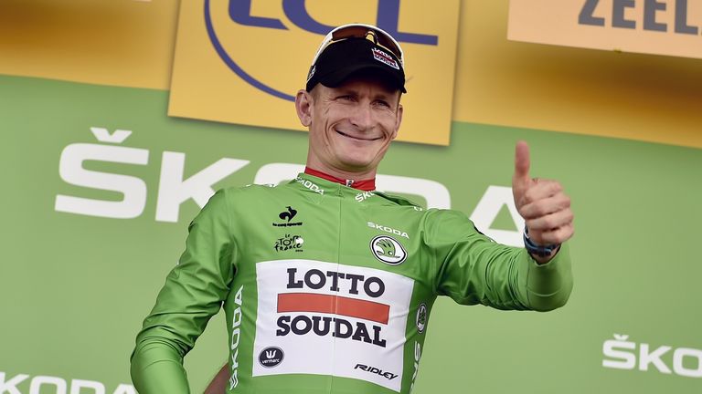 Germany's Andre Greipel celebrates his green jersey of best sprinter on the podium at the end of the 166 km second stage of the