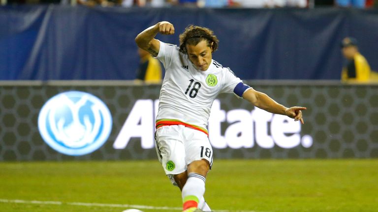 Andres Guardado scores from the penalty spot for Mexico against Panama