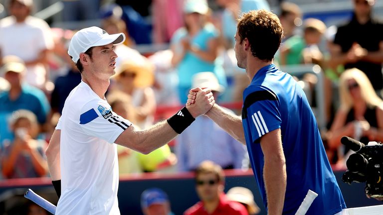 Andy Murray congratulates Ernests Gulbis after their match in Montreal