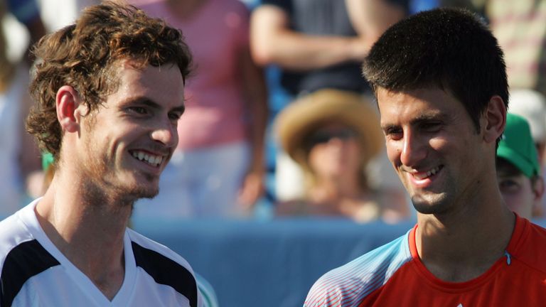 Andy Murray and Novak Djokovic of Serbia smile during the award ceremony of the Cincinnati Masters
