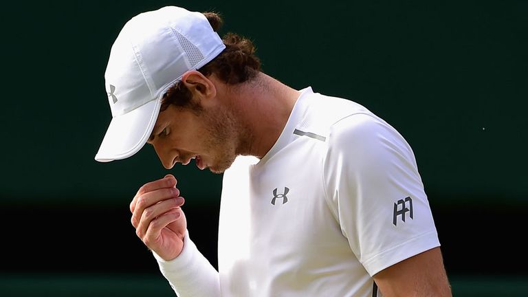 Andy Murray looks dejected during his Wimbledon semi-final against Roger Federer