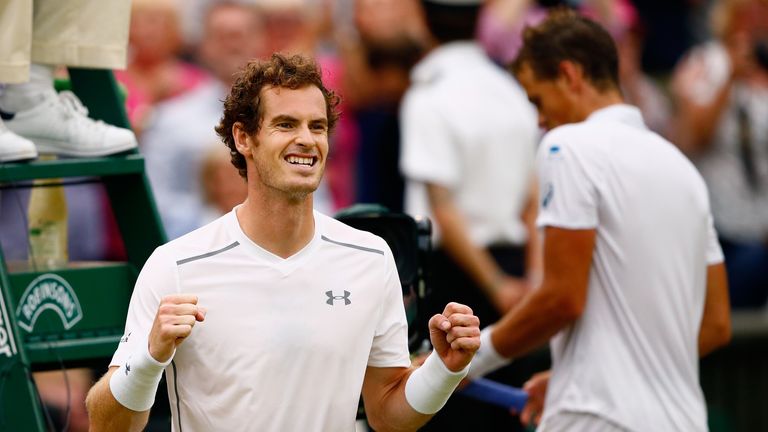 Andy Murray of Great Britain celebrates after winning his Gentlemens Singles Quarter Final match against Vasek Pospisil against Wimbledon.