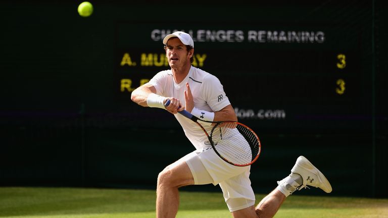 LONDON, ENGLAND - JULY 10:  Andy Murray of Great Britain plays a forehand during the Gentlemens Singles Semi Final match against Roger Federer of Switzerla