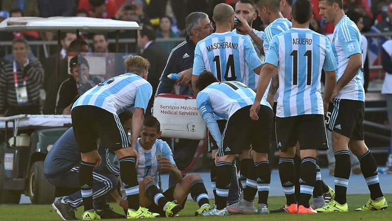 Angel Di Maria: Sits injured on the ground in the first half