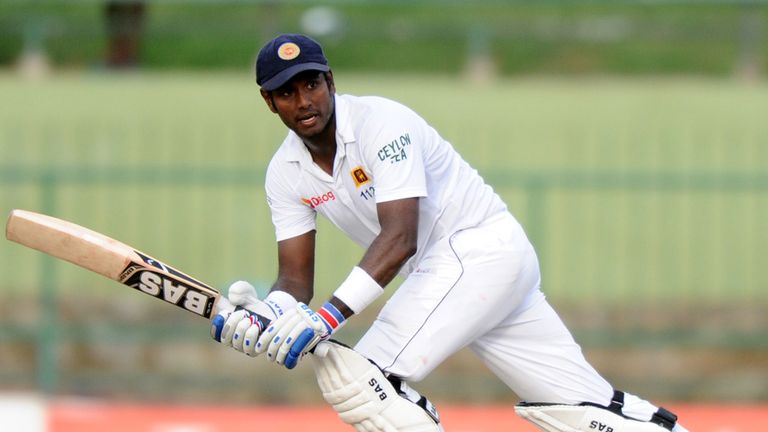 Sri Lankan cricket captain Angelo Mathews plays a shot during the third day of the third and final Test