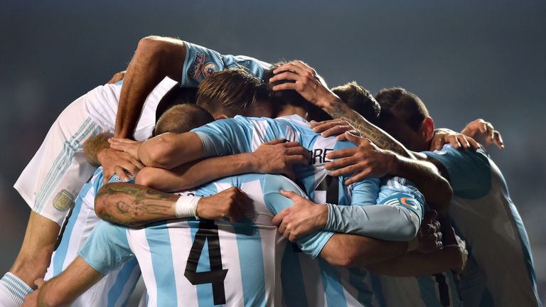 Argentina's midfielder Javier Pastore celebrates with teammates