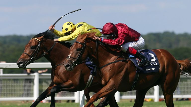Postponed (yellow silks) just gets the better of Eagle Top in the King George at Ascot