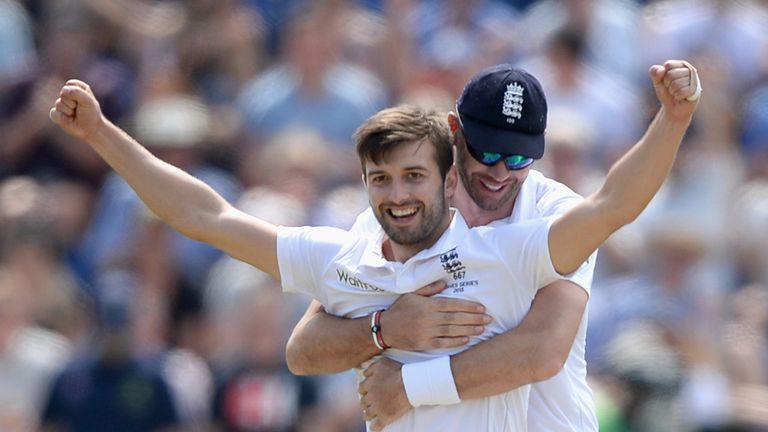 Mark Wood of England celebrates with James Anderson after dismissing Nathan Lyon of Australia 