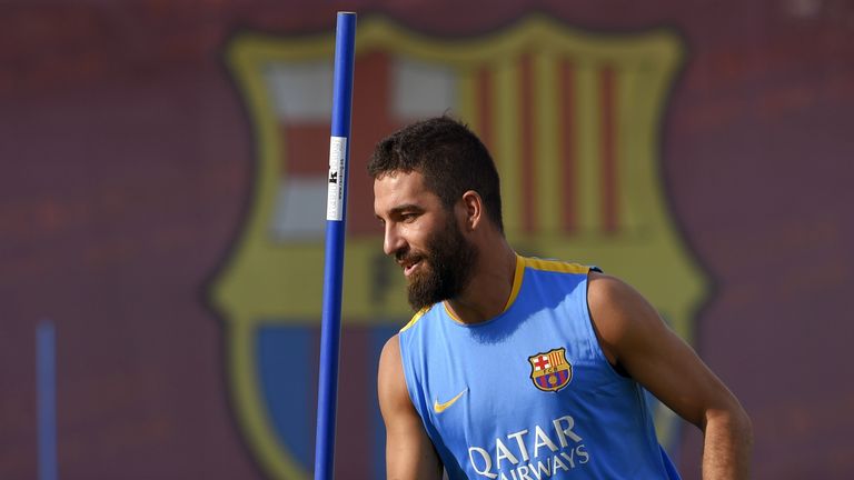 Barcelona's Turkish midfielder Arda Turan takes part in a training session at the Sports Center FC Barcelona