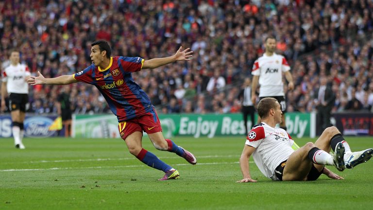 Barcelona's Pedro Rodriguez (L) celebrates after scoring during the UEFA Champions League final football match FC Barcelona vs. Manchester United in 2011