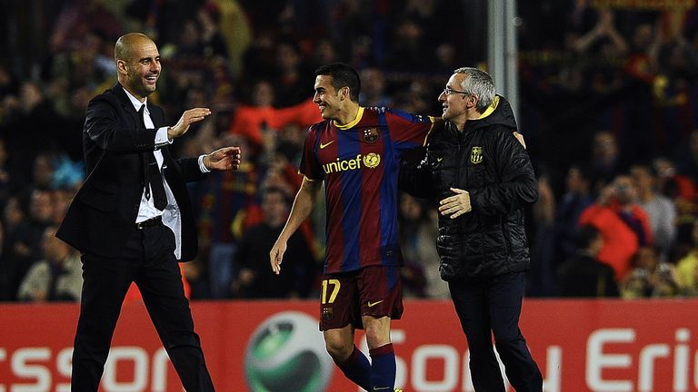 Barcelona's coach Josep Guardiola and Barcelona's forward Pedro Rodriguez celebrate after winning the Champions League semi-final second leg in 2011