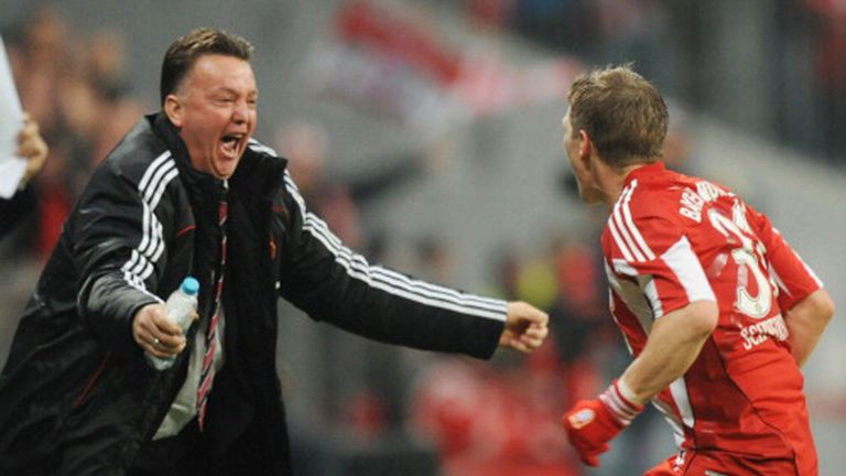 Louis van Gaal and Bastian Schweinsteiger celebrate