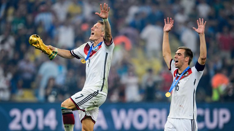 Schweinsteiger (left) and Philipp Lahm celebrate their World Cup triumph